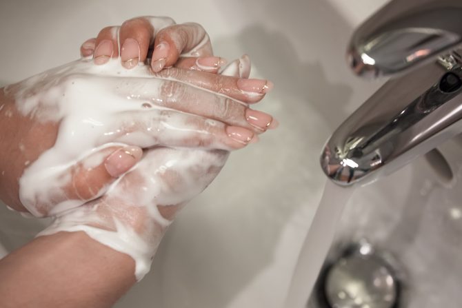 bigstock-Wash-Hands-Beautiful-Female-H-307412230-670x447