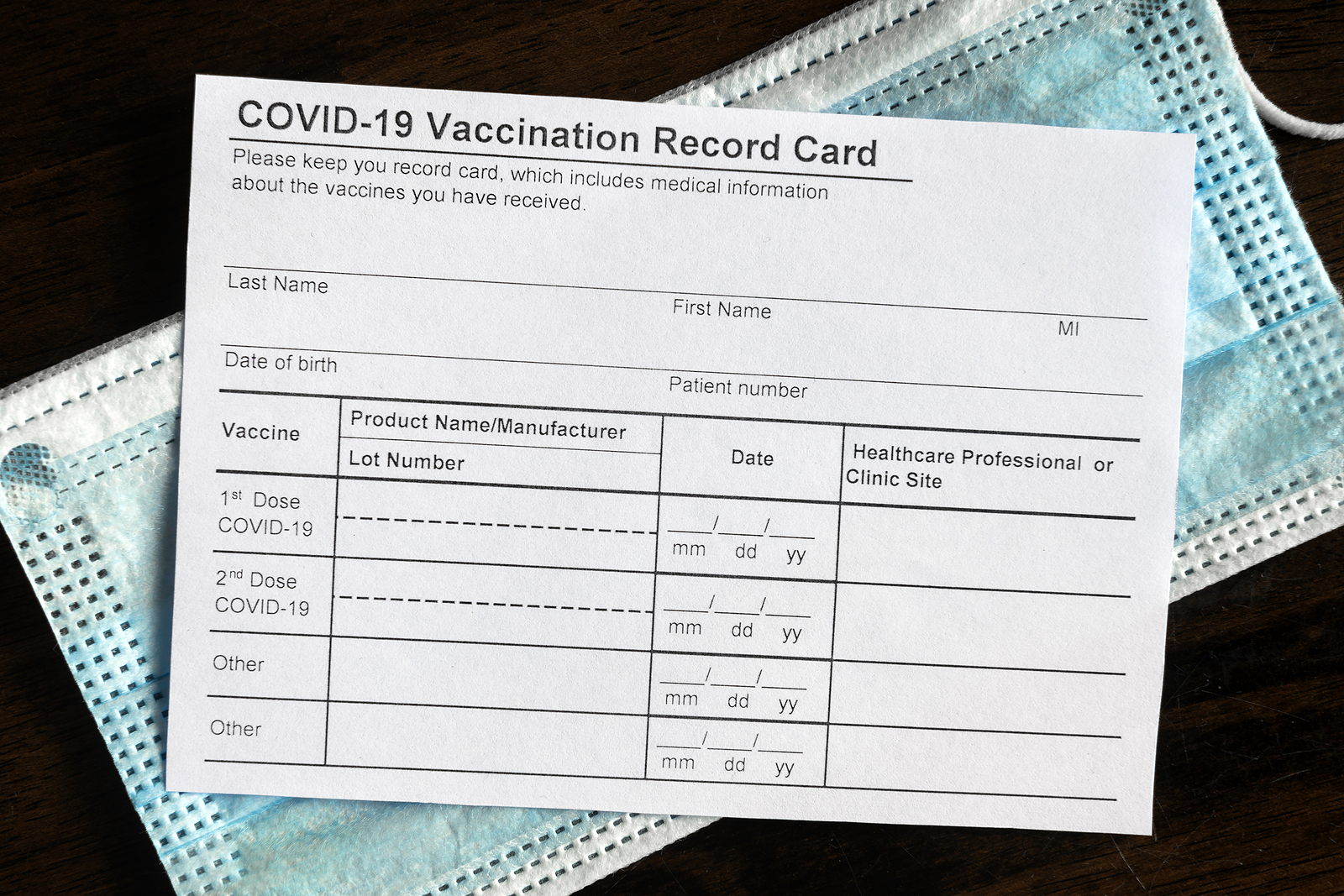 Covid 19 Vaccination Record Card On Desk Coronavirus Immunizati