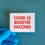 Covid-19 Booster Shots Vaccines Symbol. White Note With Words Co
